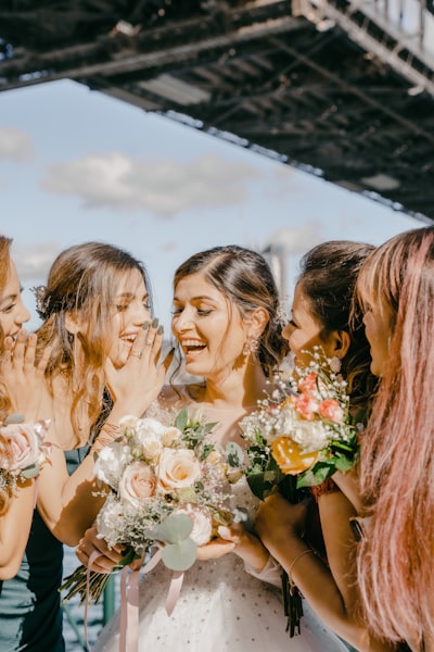 Bridesmaids wearing temporary hair extensions for wedding day styling