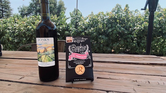 Bottle of 3 Oaks wine and a chocolate bar