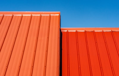 an orange metal  standing seam type of roofing
