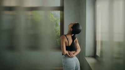 a woman with chronic pain due to a back injury