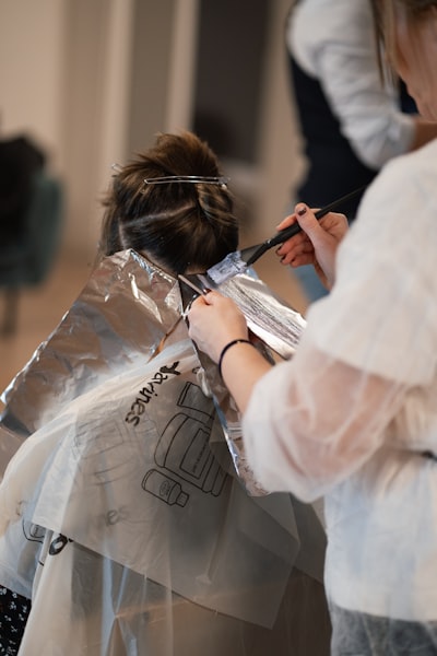 a hairstylist doing a color correction