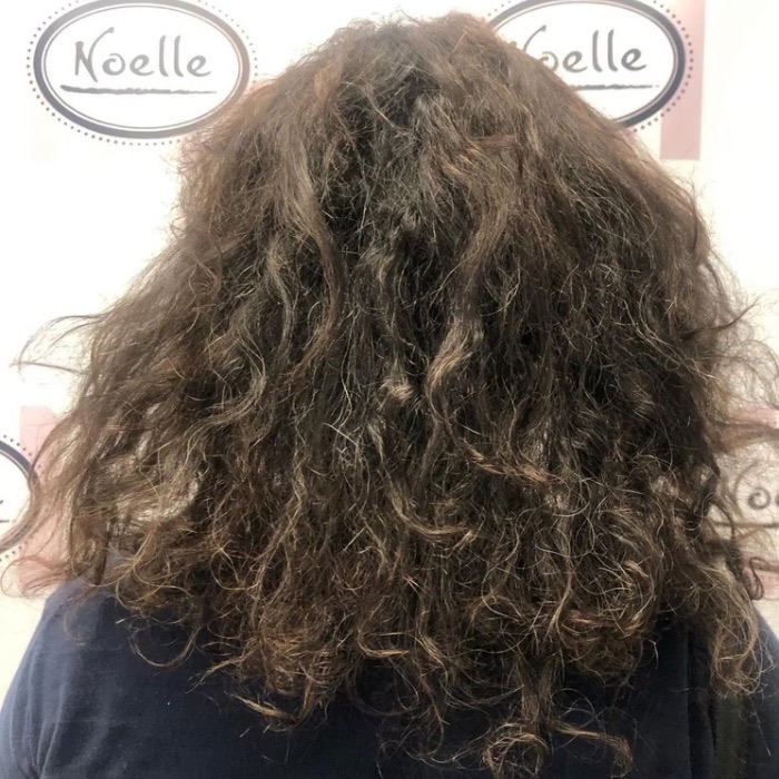 Scalp treatment done on curly hair at Noelle Salon