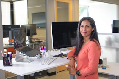 A woman over 50 wearing dark hair extensions