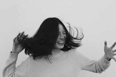 a choppy haircut with wind in the hair