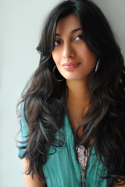 a woman with black hair and a Keratin Treatment