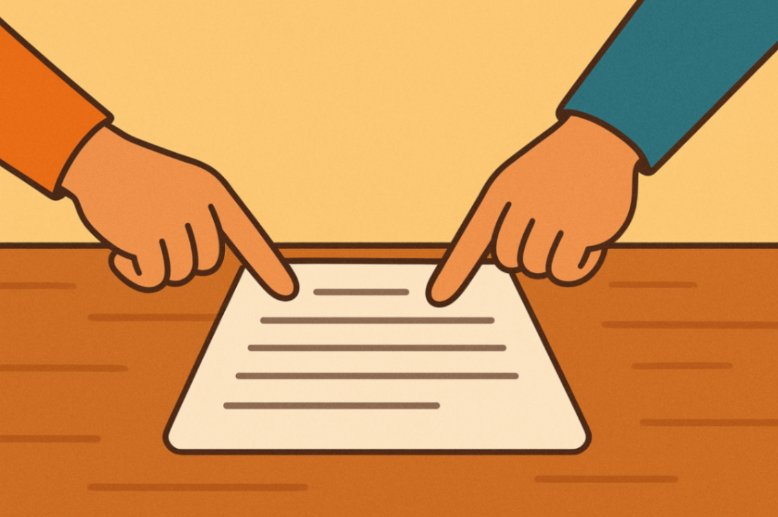 Close-up of two fingers pointing to key strategies on a behaviour support document.
