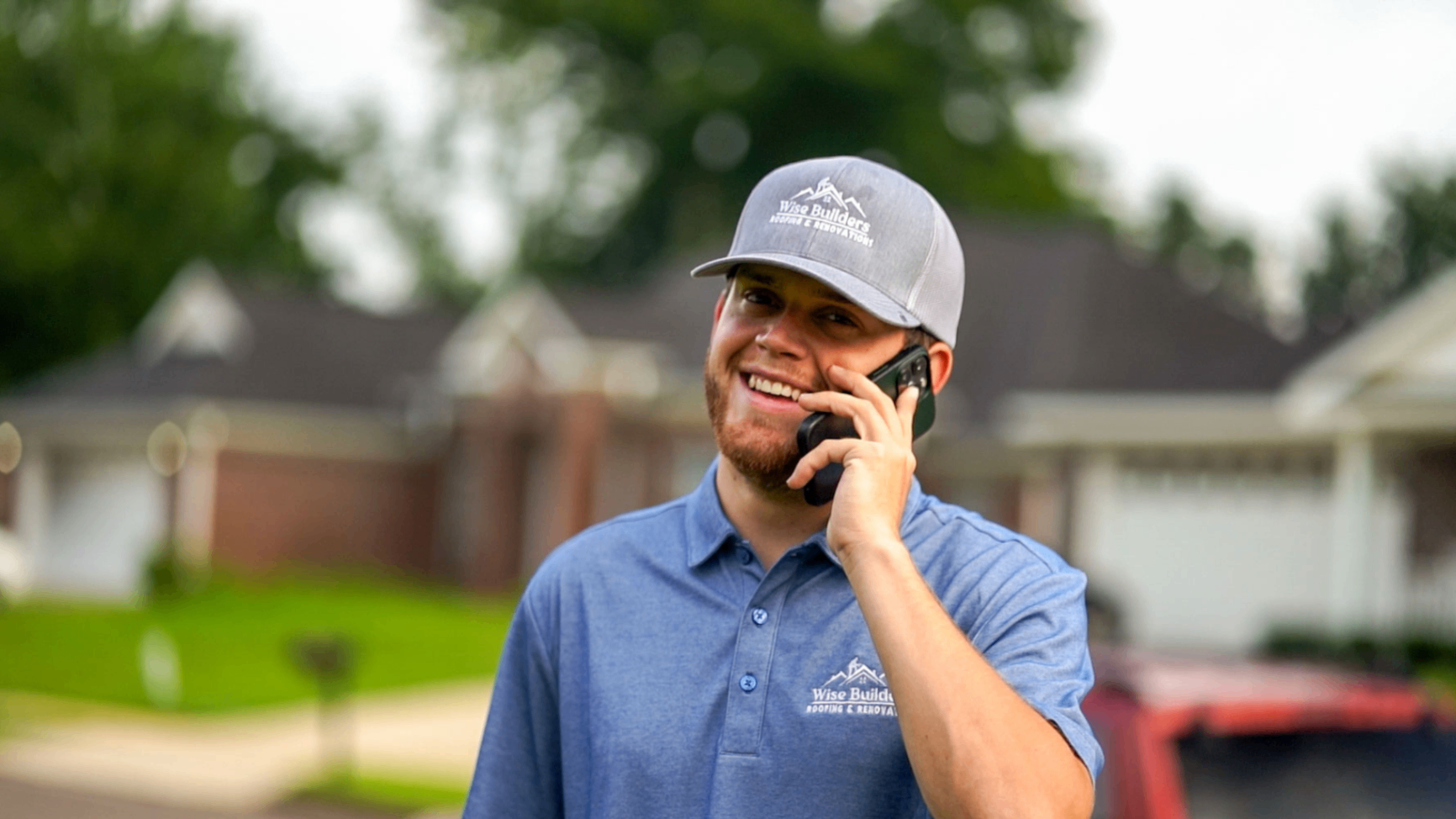 a roofer on the phone with a metal roofing customer
