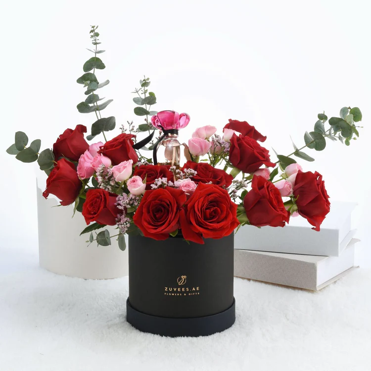 Flower box containing red and pink flowers