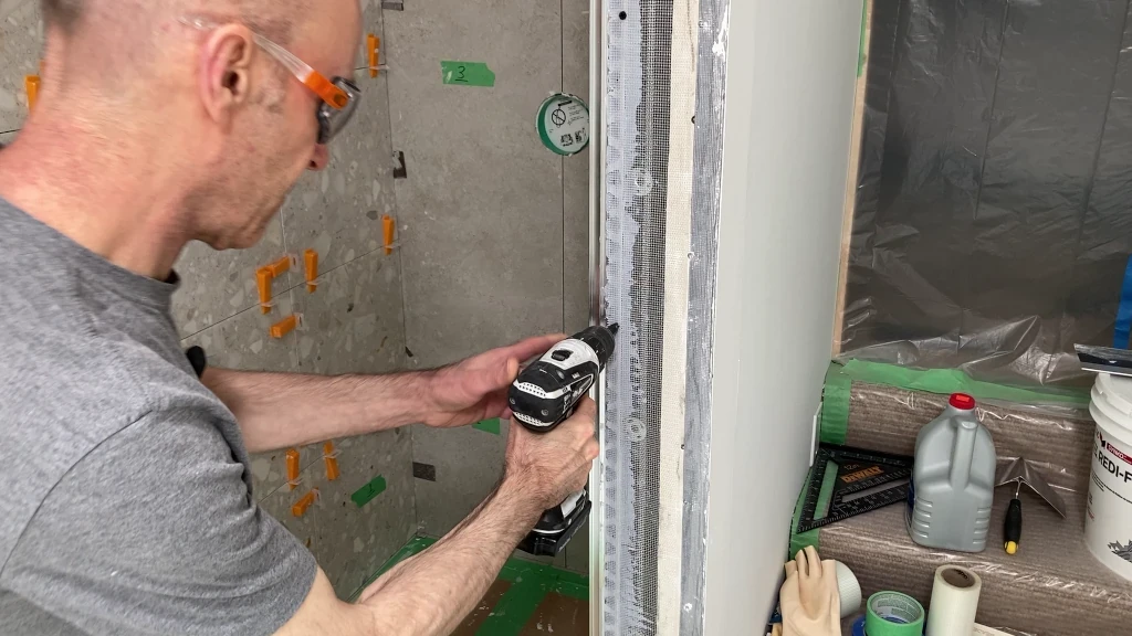Securing Glass panel trim