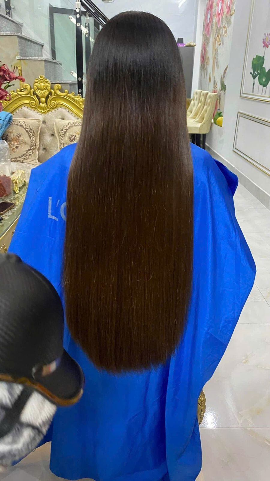 a photo of a woman wearing Noelle Salon Weft Hair Extensions
