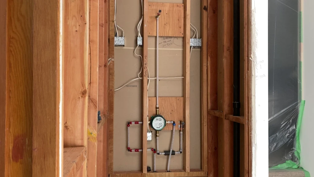 Rough-ins and backing installed on valve wall