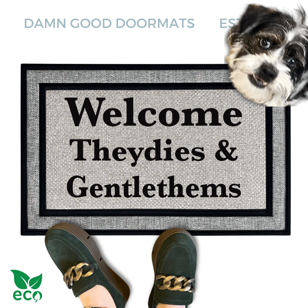 all weather Welcome Theydies & Gentlethems LGBTQIA Pronouns from Damn Good Doormats with a terrier and green suede shoes