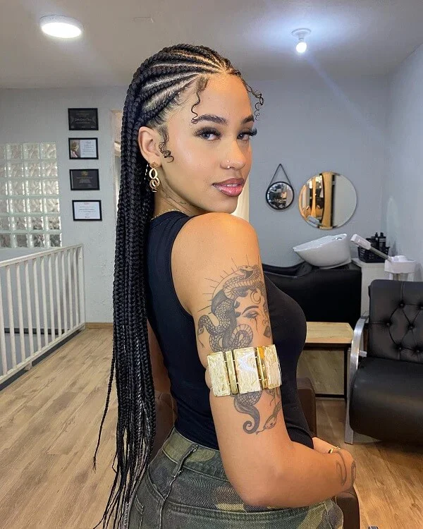 Young Black woman wearing a glossy cornrow braids wig from Sincerely4u
