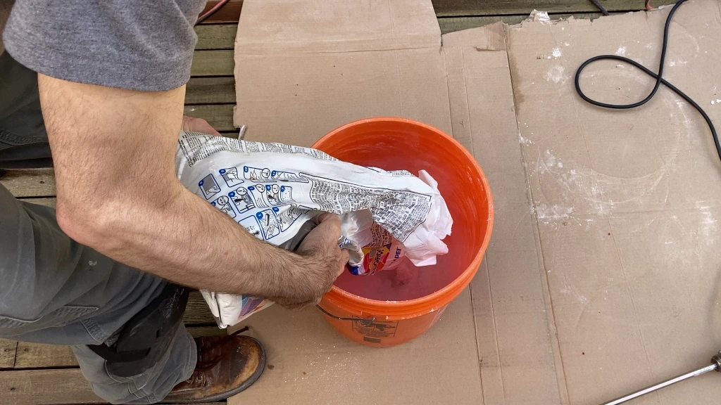 Add 1/2 bag thinset to bucket
