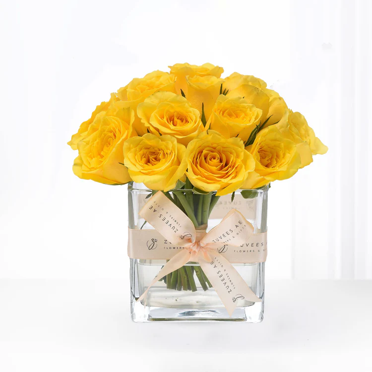 Yellow flowers in a glass vase
