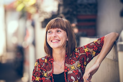 a woman over 50 wearing hair extensions to thicken her hair