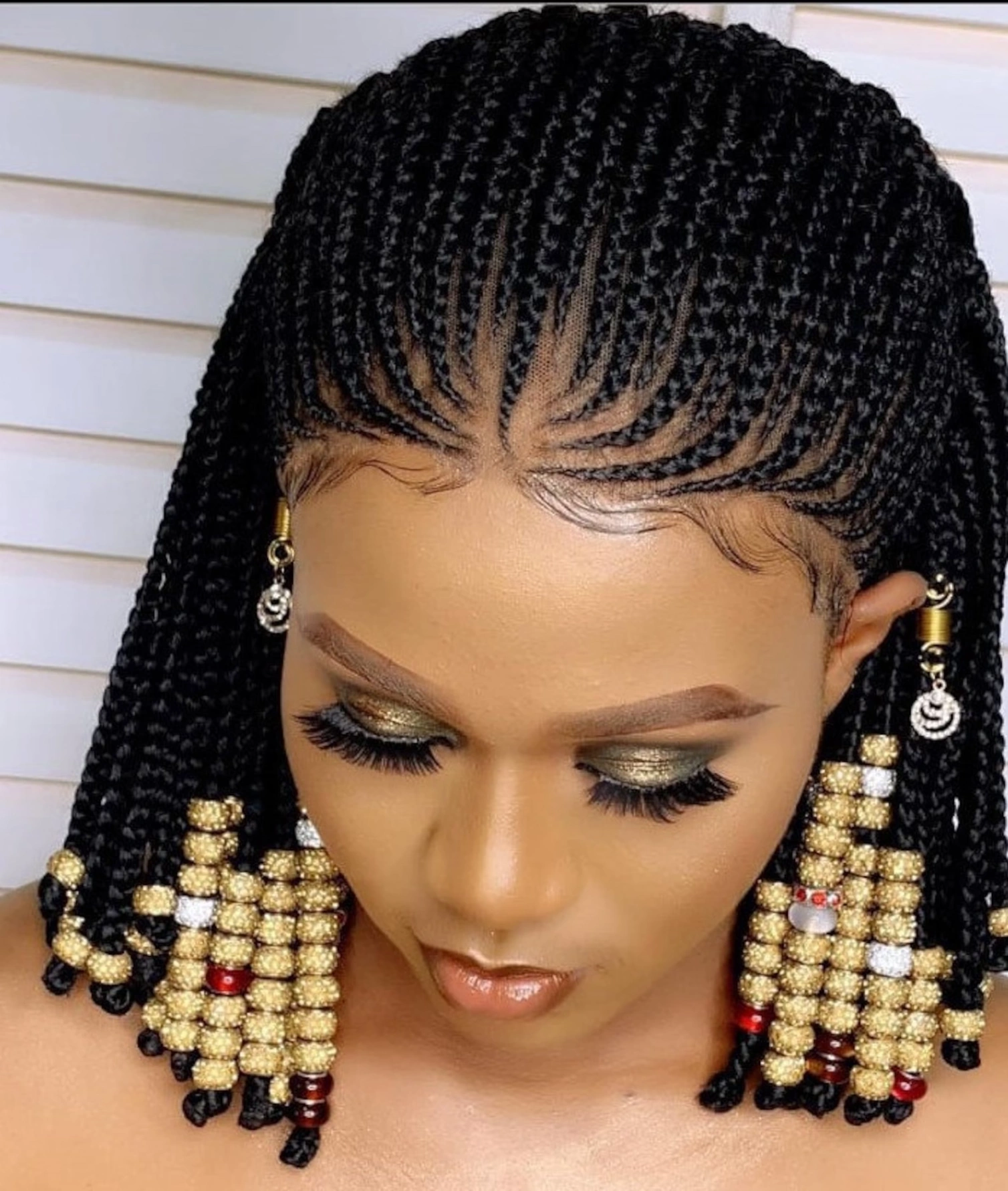 Elegant African American woman in a detailed cornrow braids wig by Sincerely4u