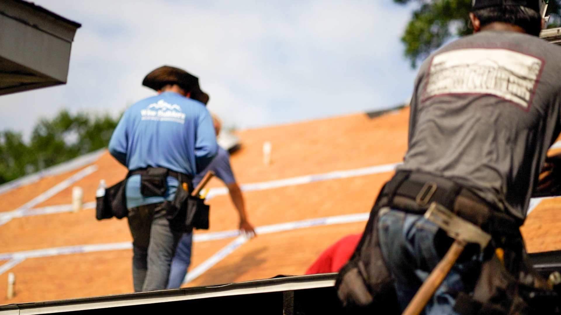 roofers from wise builders with years of experiance working on a new roof
