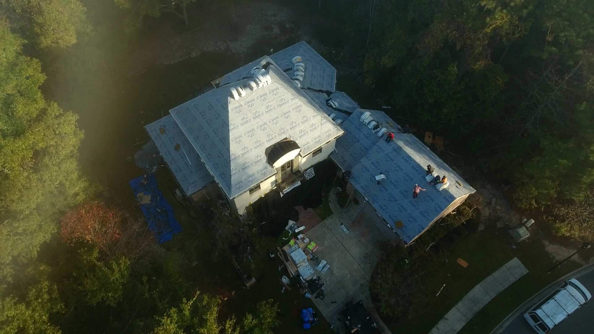 a drone photo of a roof replacment by wise builders roofing