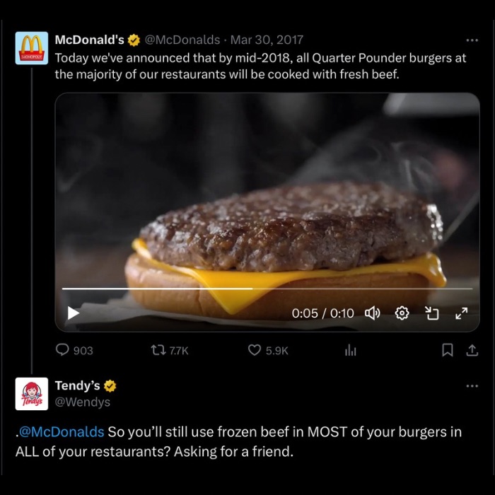 Screenshot of Wendy’s replying humorously to McDonald’s tweet about using fresh beef, highlighting a viral Twitter exchange.
