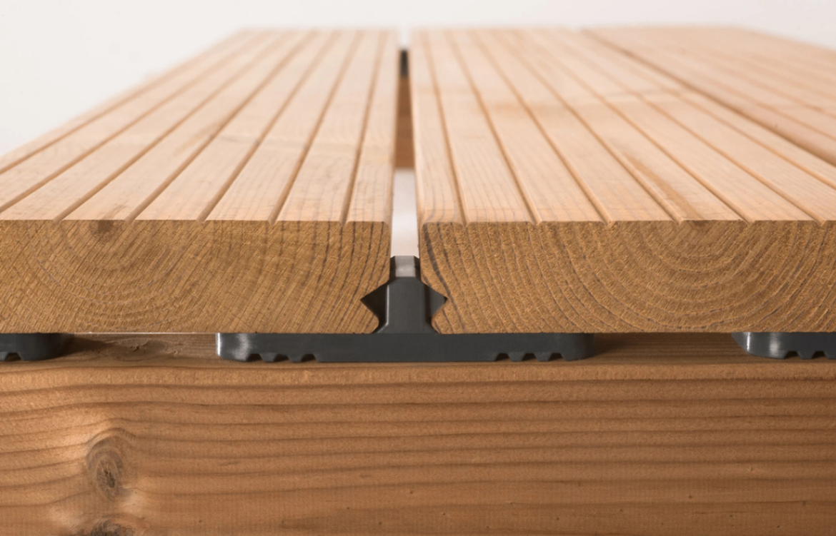 Thermowood Cladding Fixing Details showing hidden fastening system between thermally modified wood boards