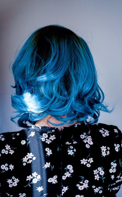 Purple and bright blue emo bob haircut with layered bangs"