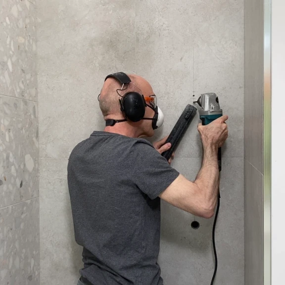 Installing hand shower wall bracket