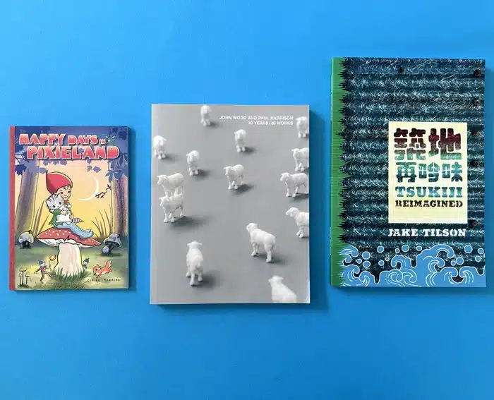 Three professionally printed books by Ex Why Zed displayed on a blue background
